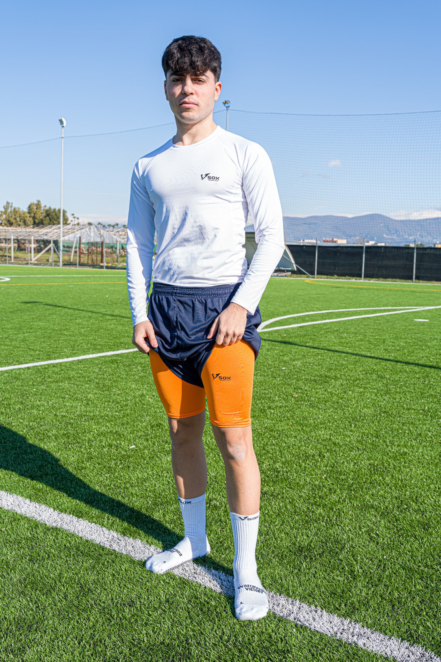 ORANGE LEG WARMERS