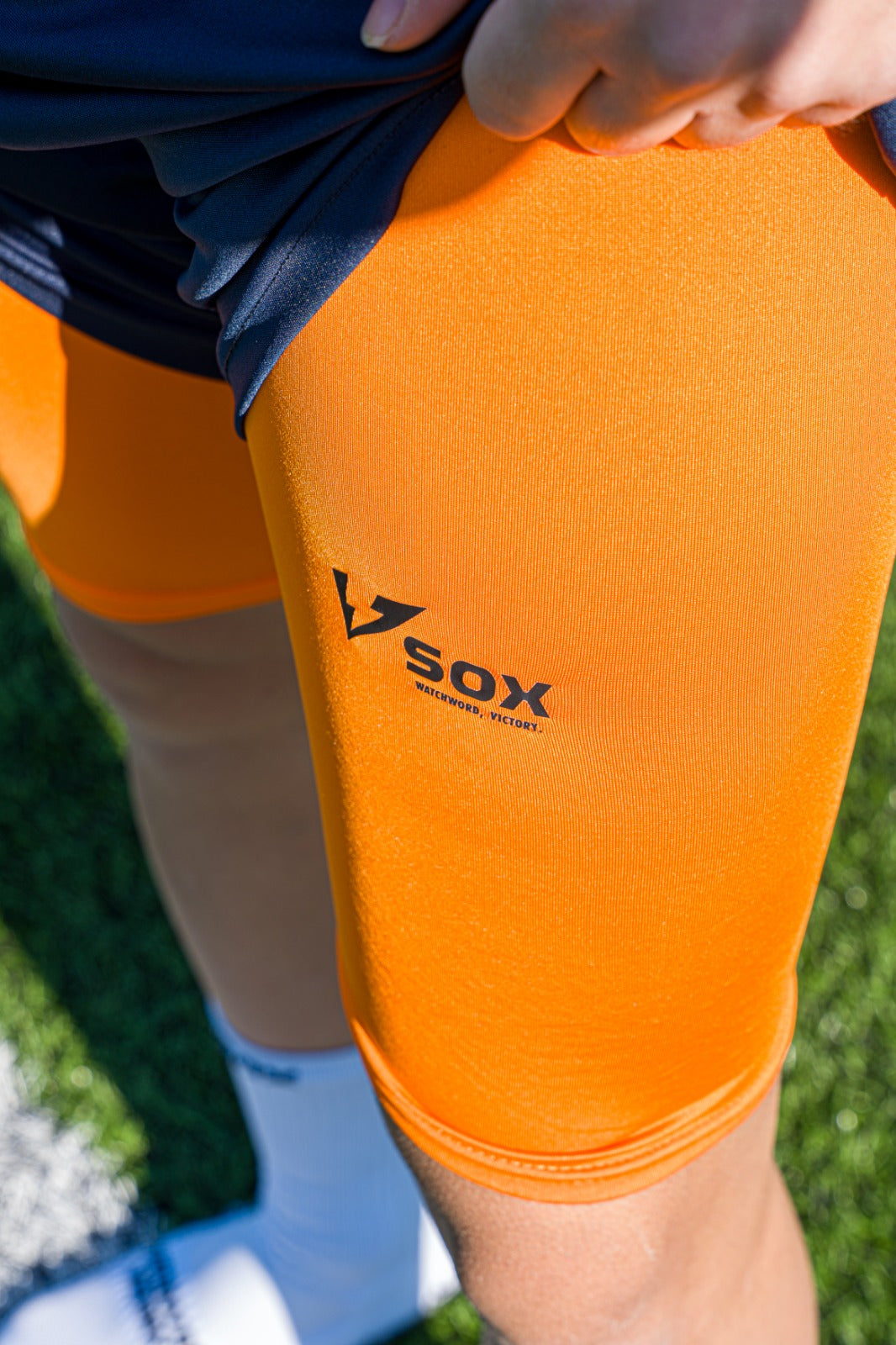 ORANGE LEG WARMERS
